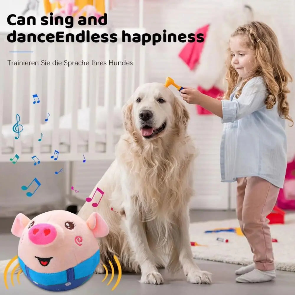 A young girl is interacting with a dog while playing with an interactive pet shake and jump ball toy.