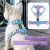 A white dog wearing a purple harness with reflective strips, demonstrating 4-point free adjustment.