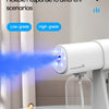 A white electric nano spray machine is shown spraying a blue mist in a modern indoor setting.