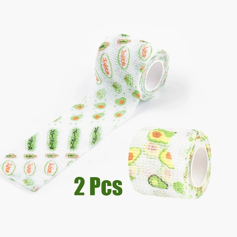 Two rolls of self-adhesive dog paw protector bandage with a pattern of green and orange fruit slices.