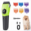 A professional pet hair clipper with various attachments and a dog sitting next to it.