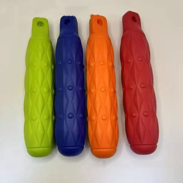 Four brightly colored durable EVA chew toys for large dogs in lime green, blue, orange, and red.