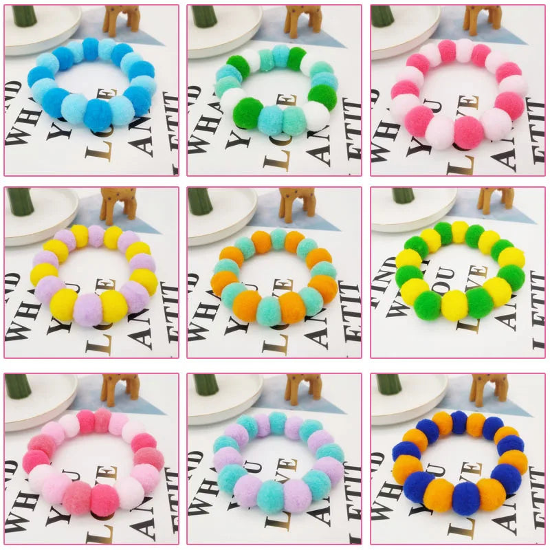 A set of colorful rainbow flower pet collars and bow ties arranged in various shades and patterns.