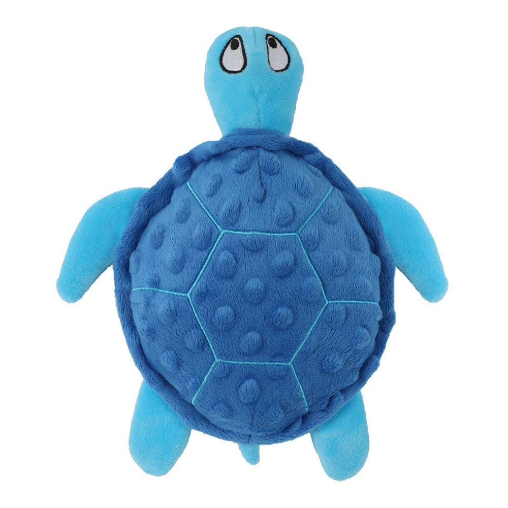 A bright blue interactive sea turtle plush toy with a textured shell and large eyes.
