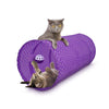 A gray kitten is playing inside a purple collapsible cat tunnel with a ball.
