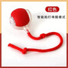A red, motion-activated smart pet ball with a string attached for interactive play.