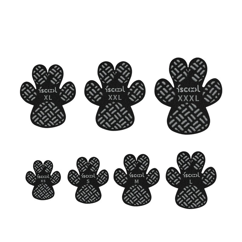 A pack of four black anti-slip dog paw grips in various sizes labeled XL, XXL, XXXL, S, M, and L.