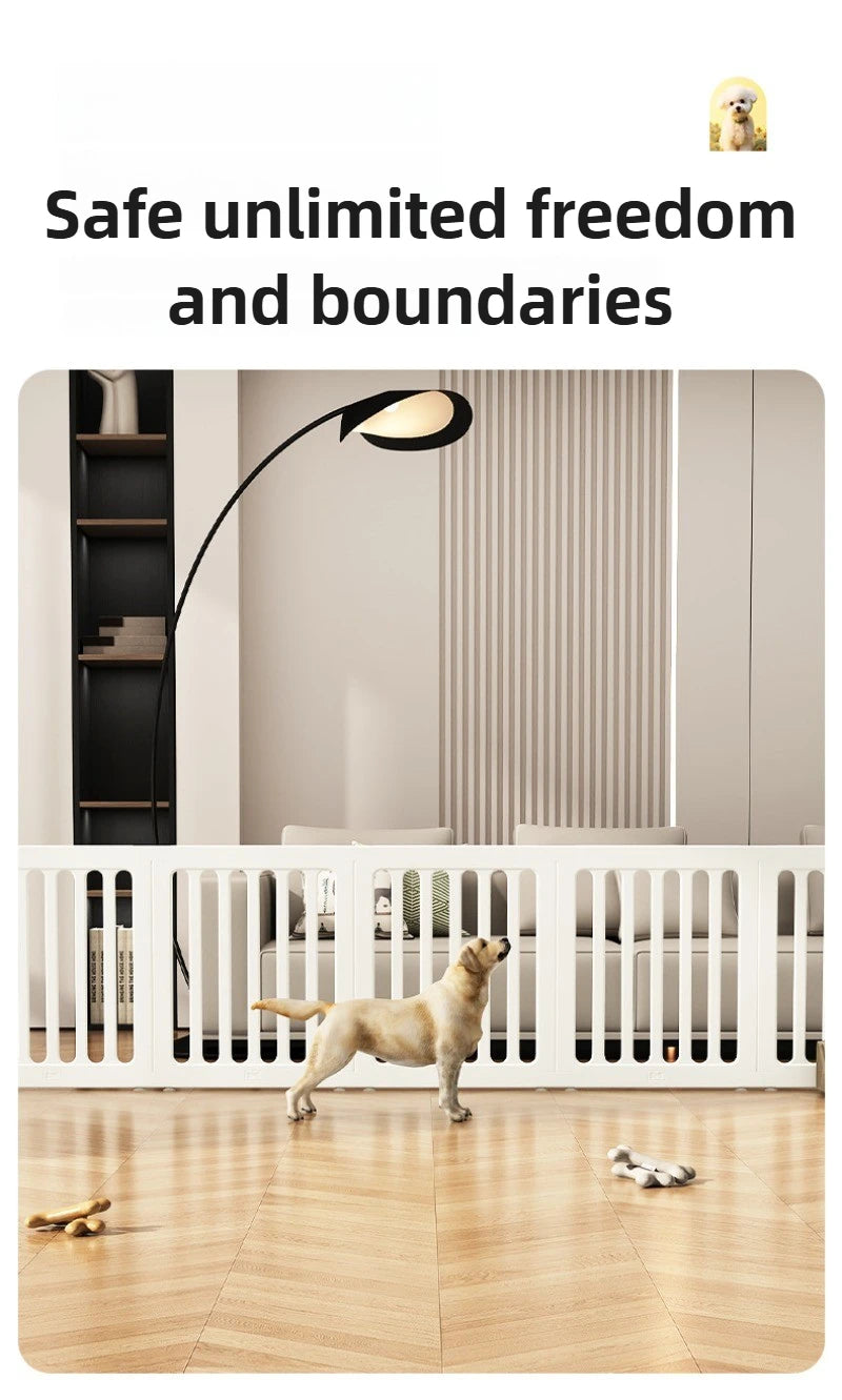 A light tan dog is standing in front of a white wooden pet fence cage with vertical slats.