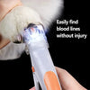 A hand is using a professional LED pet nail clipper to find blood lines on a cat's paw.