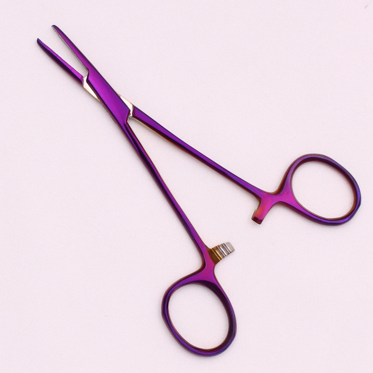 A pair of professional stainless steel pet forceps with purple handles and a silver tip.