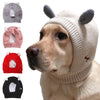 A light beige knit ear muff hat worn by a dog, shown alongside other colored options.