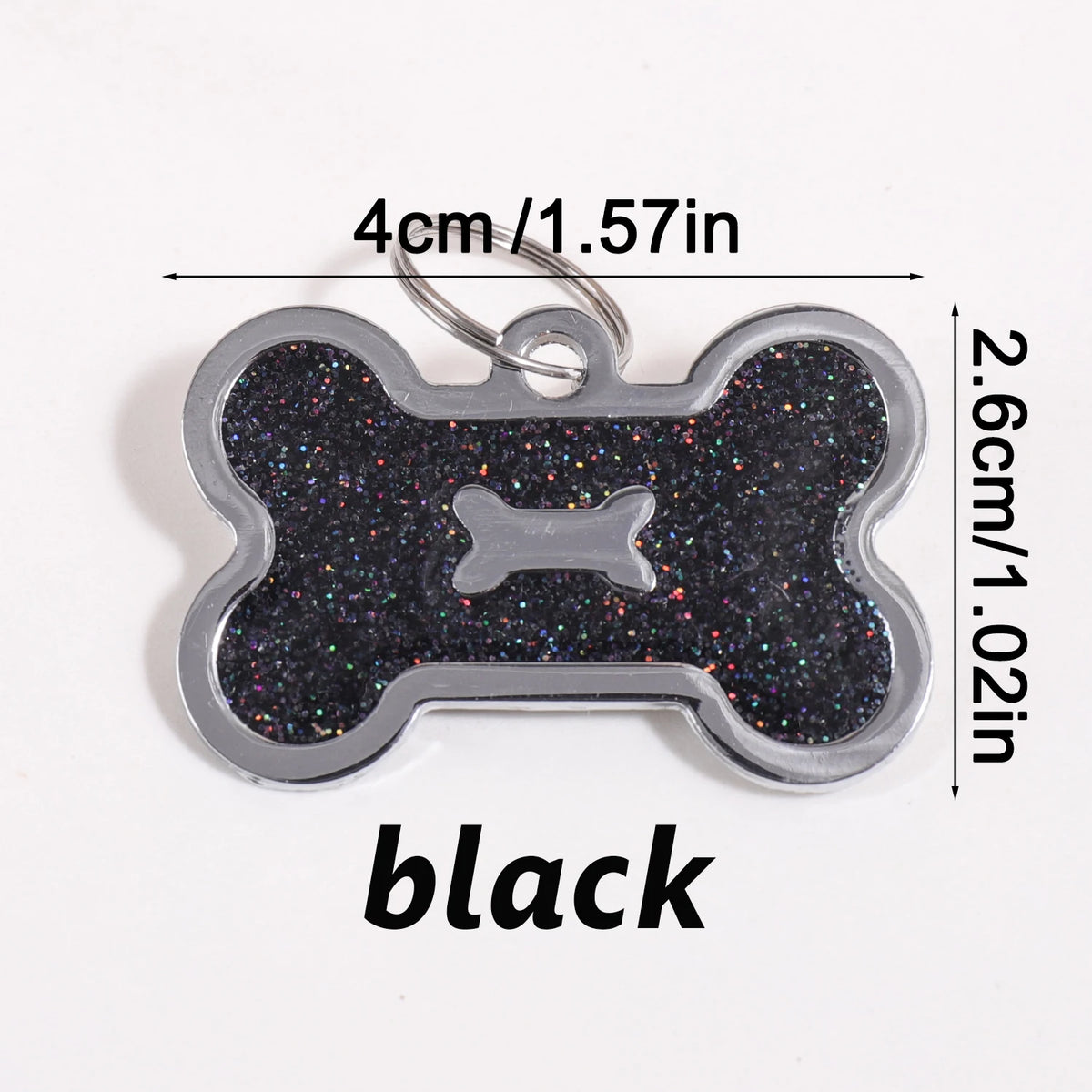 A black bone-shaped dog ID tag with a glitter finish, measuring 4cm long.