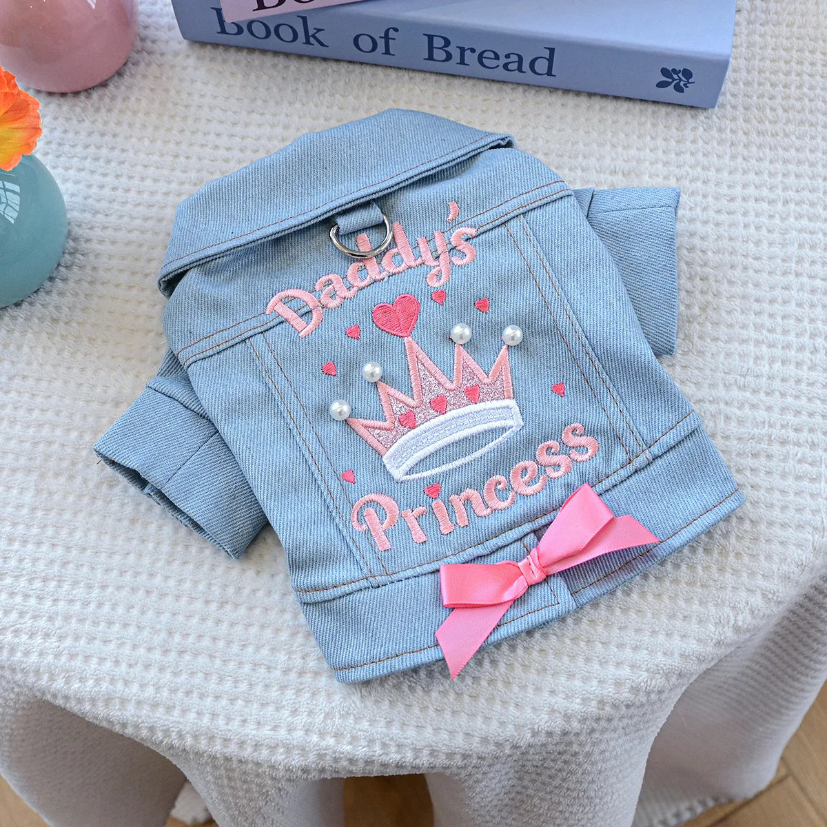 Light blue denim jacket embroidered with a pink crown and princess text for dogs