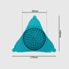 A teal silicone licking mat for dogs and cats featuring a suction cup design.