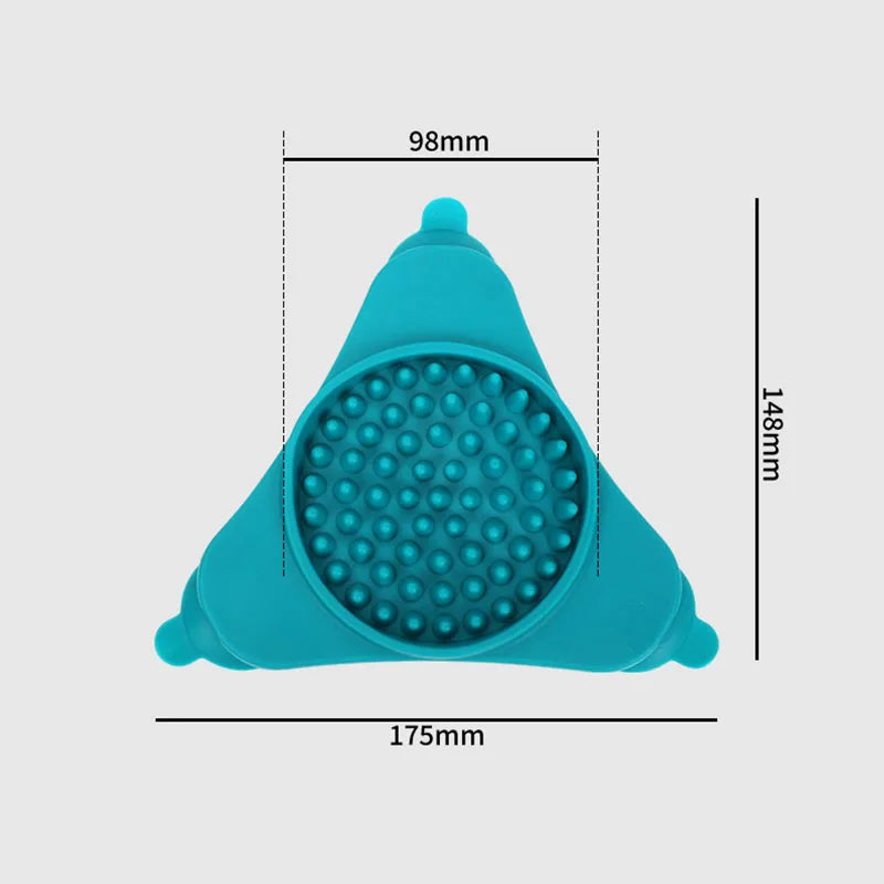 A teal silicone licking mat for dogs and cats featuring a suction cup design.