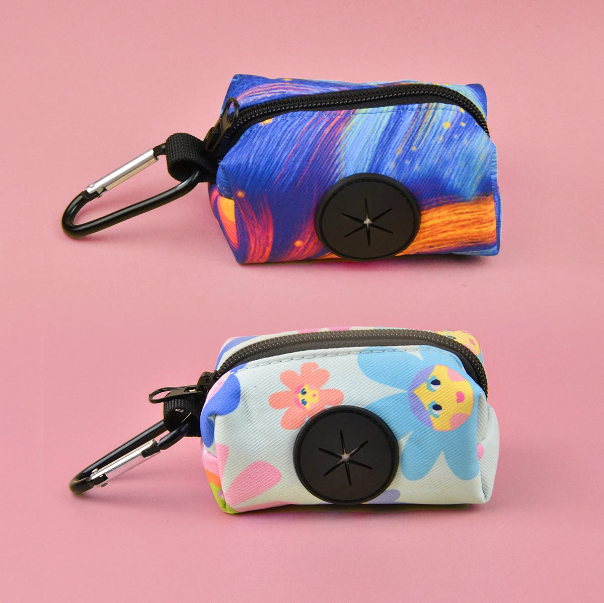 A vibrant blue and purple patterned fabric pouch with a black zipper and clip, designed as a stylish dog poop bag holder.