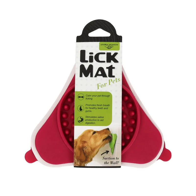 A pink silicone licking mat for pets with a suction cup is shown in a retail package.
