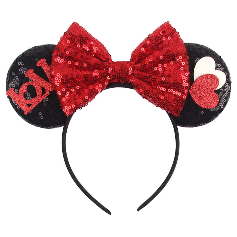 Schwarzes Mausohr-Headband mit roter Pailletten-Schleife und Herzakzenten.