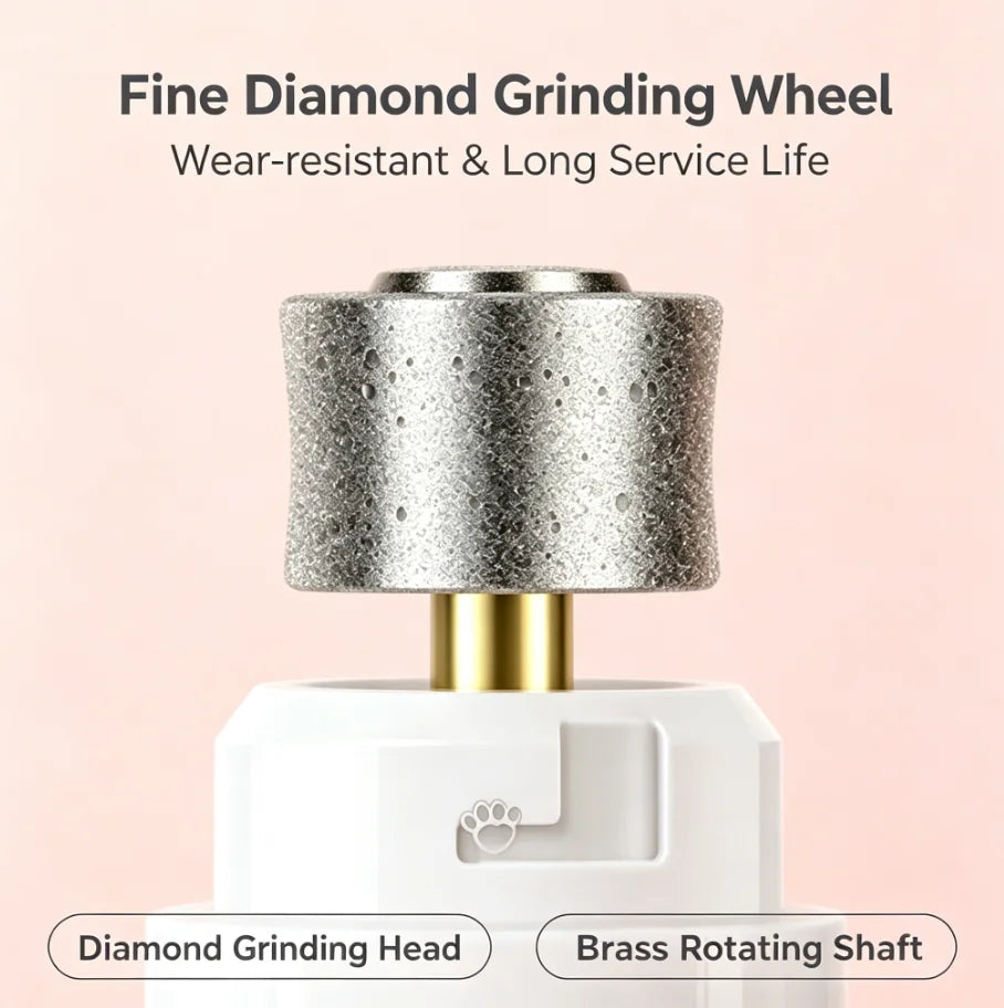 Close-up of a fine diamond grinding wheel with a brass rotating shaft and a white housing for a pet nail trimmer