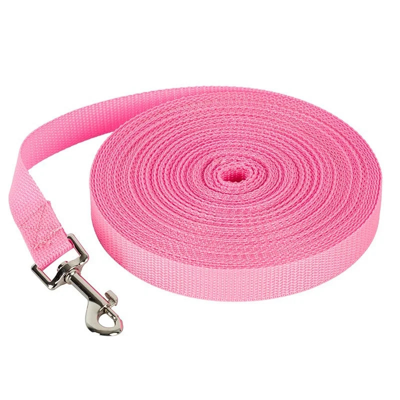 Pink durable nylon dog training leash rolled up for storage