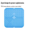 A blue silicone lick mat with three zoned sections for dog bathing and slow food training.
