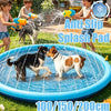 An anti-slip splash pad filled with water being used by children and a dog outdoors.