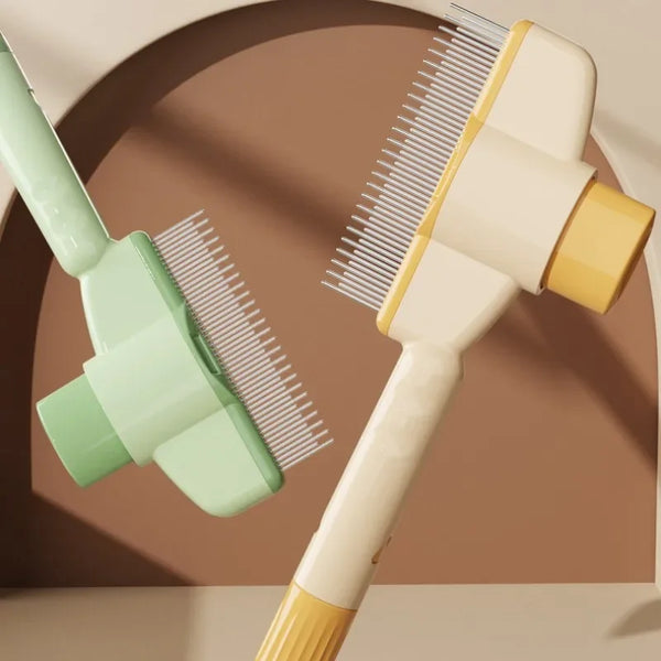 A light green and yellow self-cleaning pet brush with massage pins shown diagonally against a brown background.