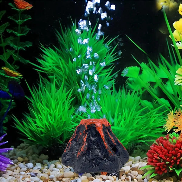 Aquarium volcano air bubbler with realistic erupting bubble effect surrounded by aquatic plants and gravel