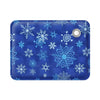 A blue silicone pet cooling mat patterned with white snowflakes for dogs and cats