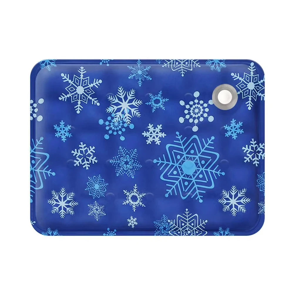 A blue silicone pet cooling mat patterned with white snowflakes for dogs and cats