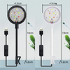 Une paire de lampes LED pour aquarium à clipser, une noire et une blanche, avec câbles d'alimentation USB.
