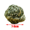 A ball of natural wooden chew toy for small rodents, measuring 7-9 cm.