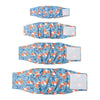A set of blue and orange patterned washable belly straps for male dogs.