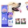 A dog is shown receiving an oral spray from a dispenser bottle for dental care.