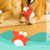 A fluffy dog is interacting with an orange crab plush toy, highlighting features like tap activation and built-in music.