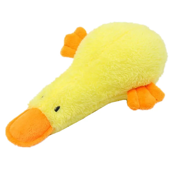 A bright yellow plush duck toy with orange beak and feet.