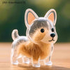 Klares Acryl-Anhänger mit einem Fuchs-Welpe mit flauschigem orangefarbenem Fell und schwarzen Augen.