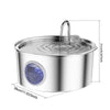 Stainless steel pet water fountain with a visible pump mechanism and clear water bowl.