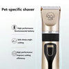 A close-up of a gold pet shaver with a black body and a dog silhouette, highlighting its features.