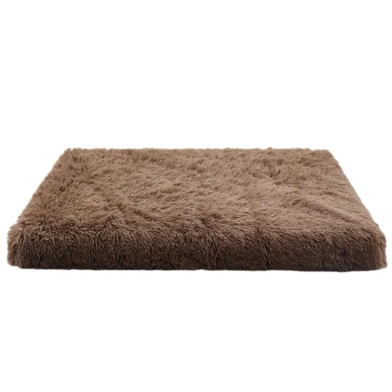 A rectangular, brown ultra plush orthopedic dog bed with a fluffy texture.