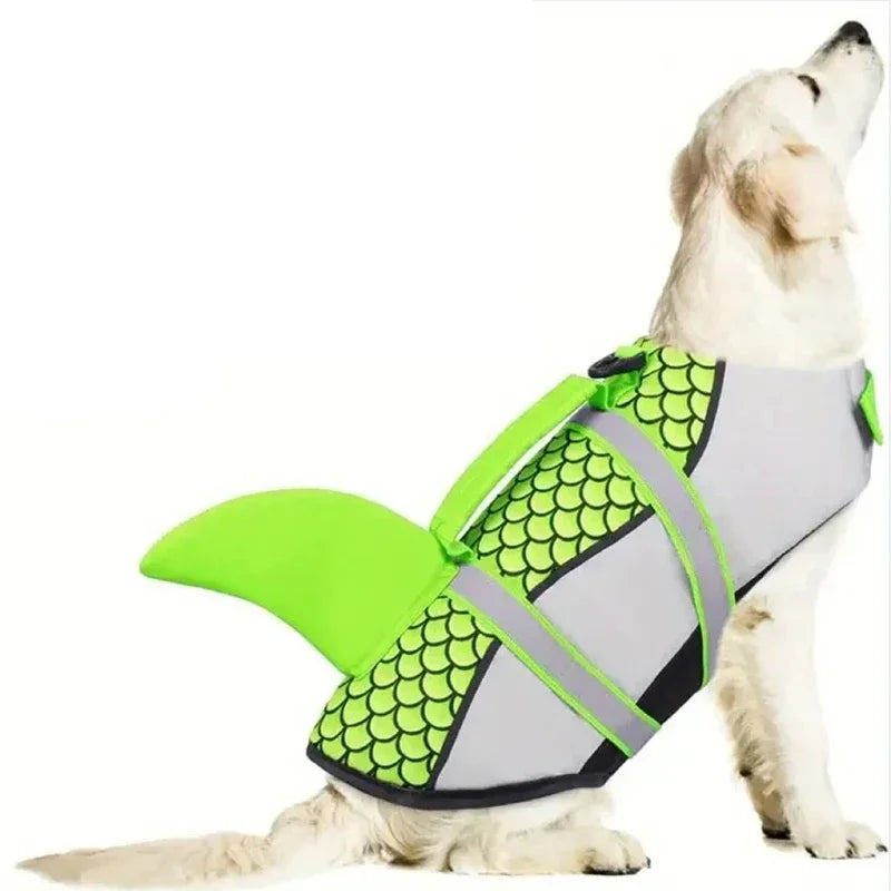 A white dog wearing a bright lime green swimming life jacket for water activities.