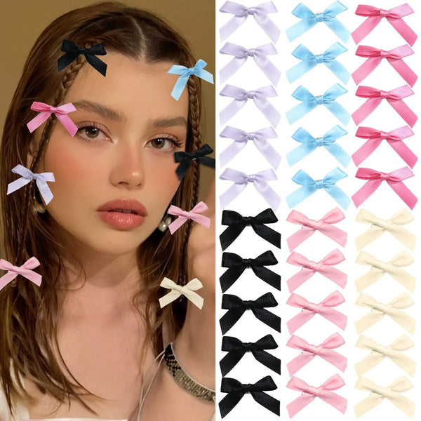 A collection of pink, blue, and white ribbon bow hair clips displayed next to a woman's hair.