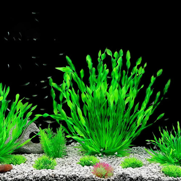 A dense clump of bright green artificial aquarium plants growing in light gravel.