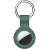 A silicone AirTag protective cover with a metal keychain ring and a dark green body.