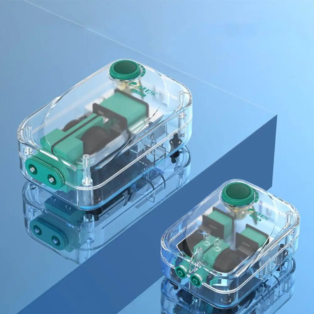 Clear plastic aquarium air pump with green components shown from above.