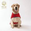 A golden retriever wearing a red all-weather dual-sided dog raincoat.