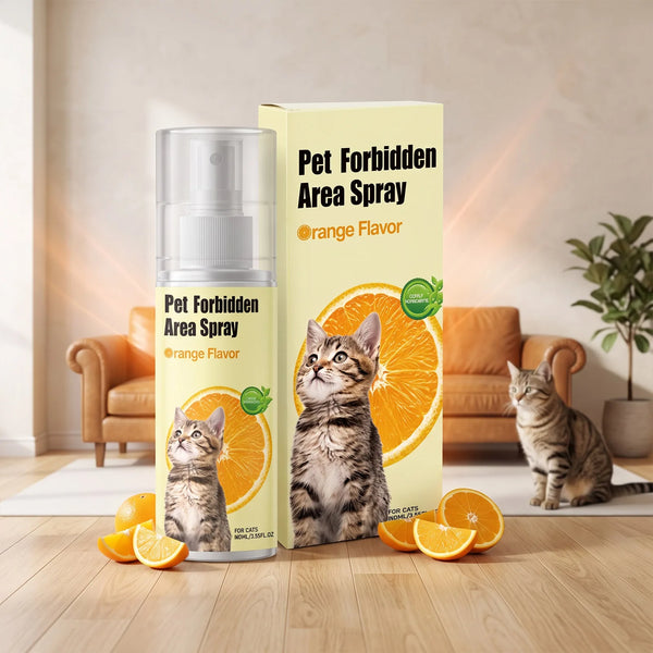 A bottle of Pet Forbidden Area Spray with orange flavor stands next to a box, surrounded by fresh oranges and cats.