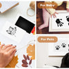 Une collection de quatre kits d'empreintes pour animaux, bébé et plantes, pour souvenirs.