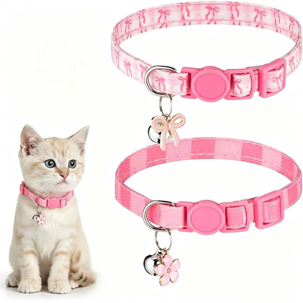 A pink plaid cat collar with a bow pendant and matching collar strap shown next to a kitten.