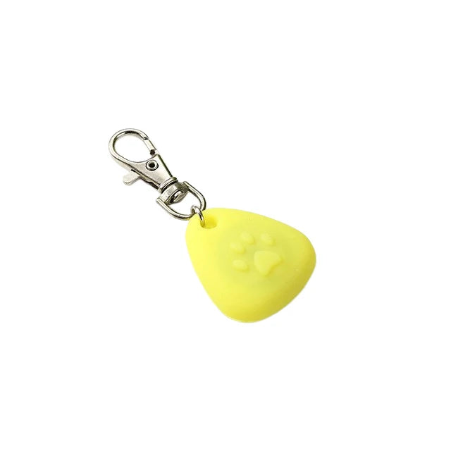 Yellow waterproof LED pet collar light for dogs and cats with a metal clip.